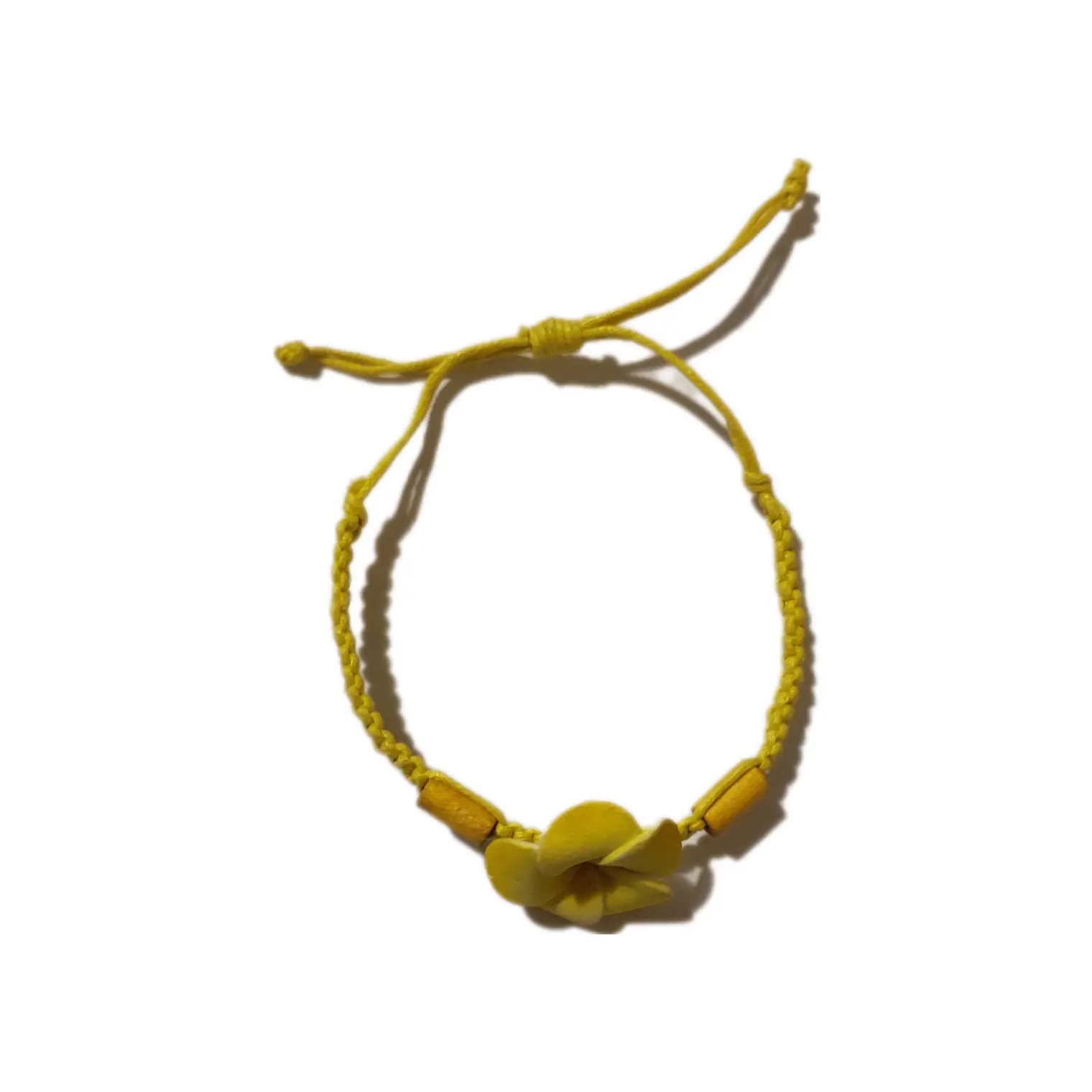Pulsera de hilo ajustable con flor tipanie amarilla 3