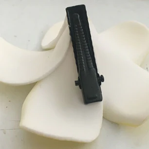 Flores Tipanie naranja con blanco con pinza