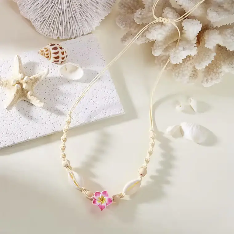 Colgante de hilo con pure blanco y tipanie fucsia 2