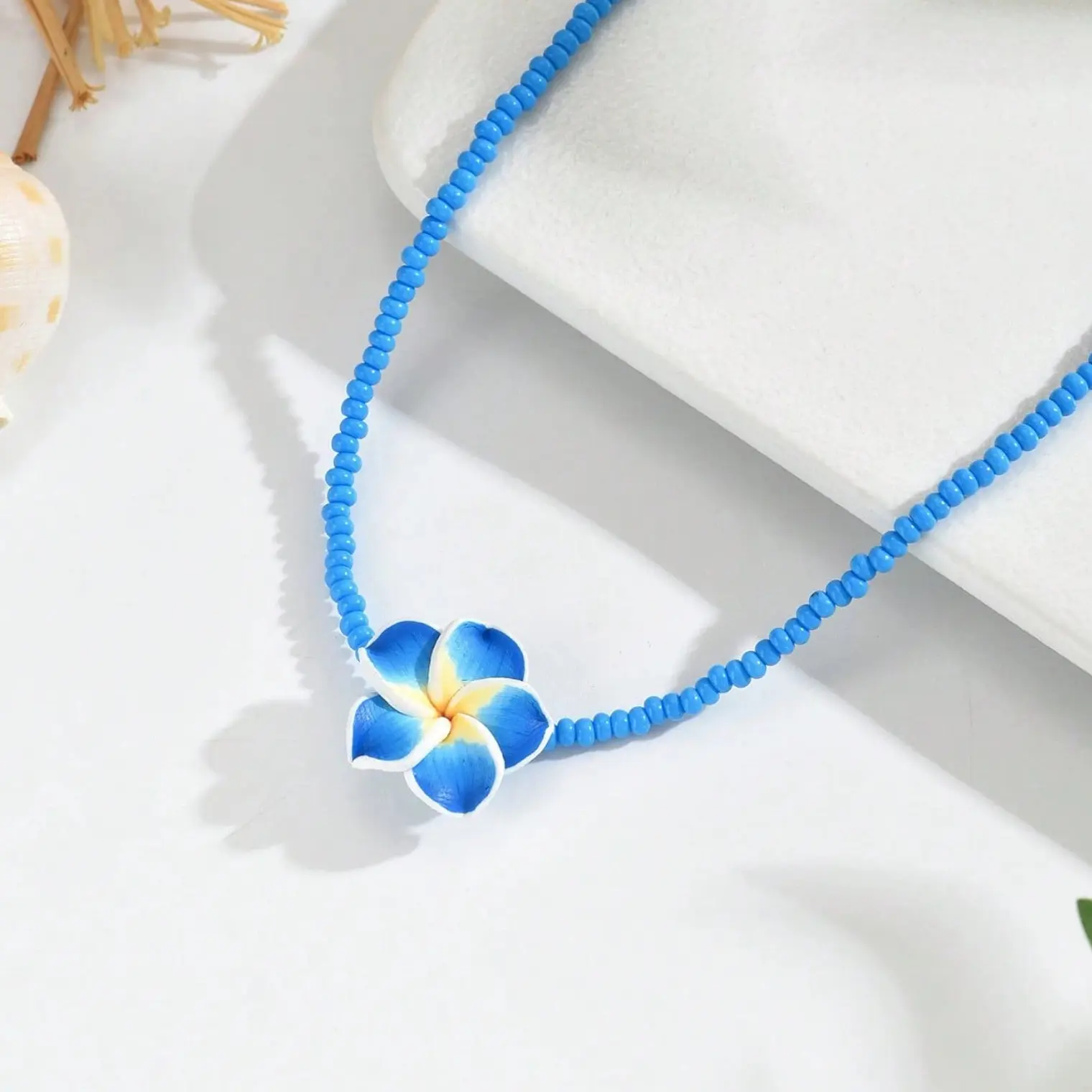 Colgante para niña mostacilla azul y tipanie azul 35cm 1