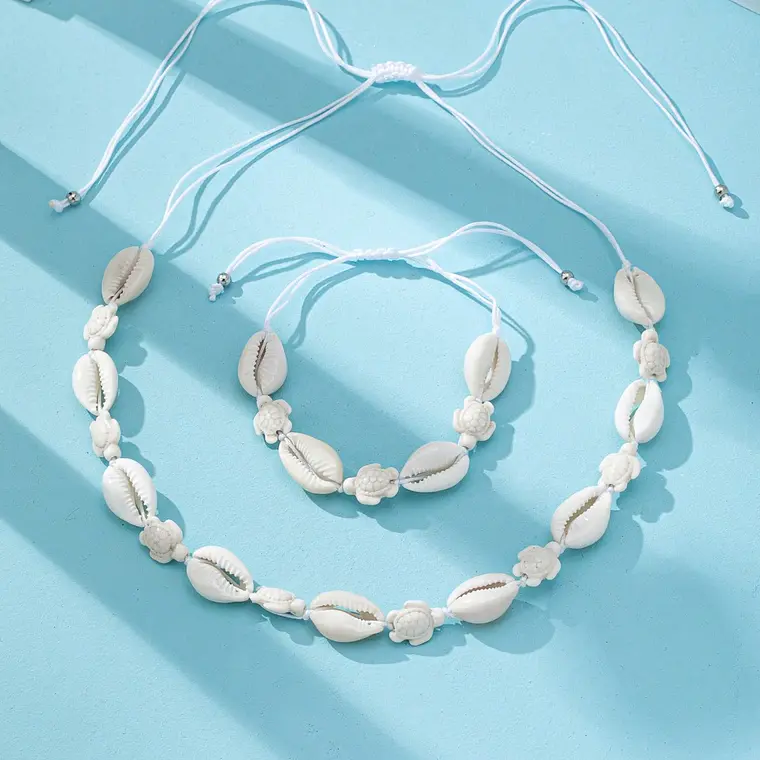 Conjunto colgante y pulsera pure y tortuga blanca 2
