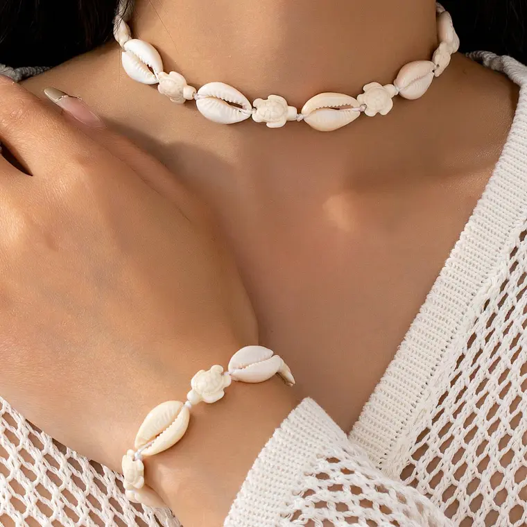 Conjunto colgante y pulsera pure y tortuga blanca 1