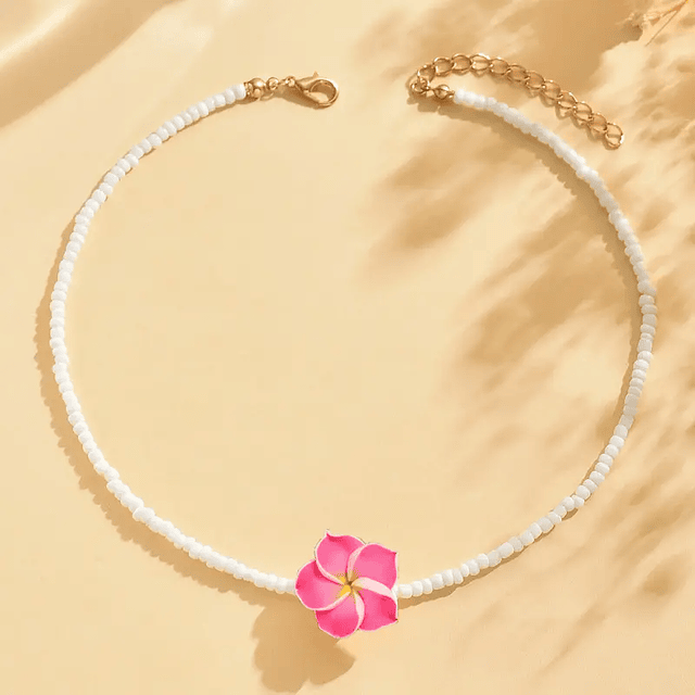 Colgante para niña mostacilla blanca y tipanie fucsia 35cm