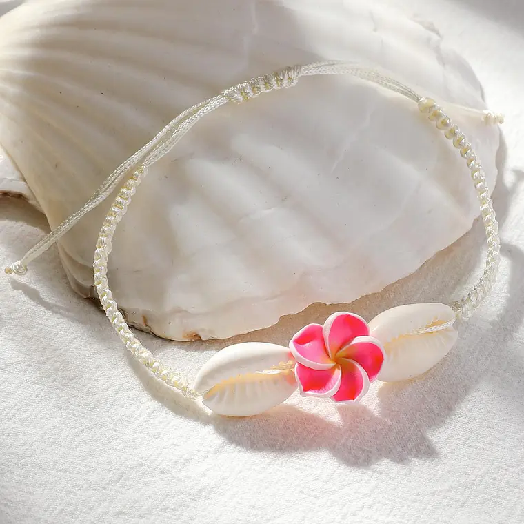 Pulsera de hilo con conchas pure blanco y tipanie fucsia 2