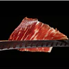 Jamón Ibérico de Bellota D. O. JABUGO Et. Negra - Cortado a cuchillo 70 g. Sellado en atmósfera.