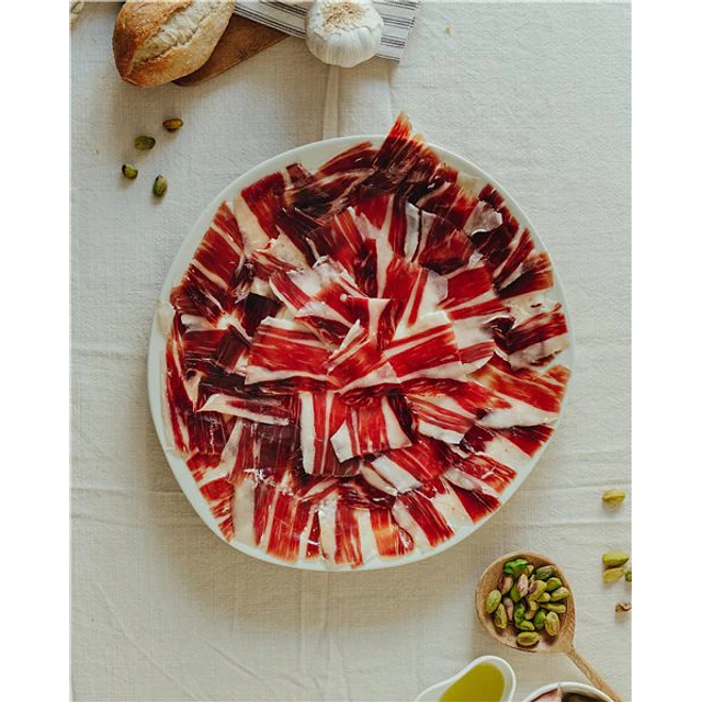 Jamón Ibérico de Bellota D. O. JABUGO Et. Negra - Cortado a cuchillo 70 g. Sellado en atmósfera.