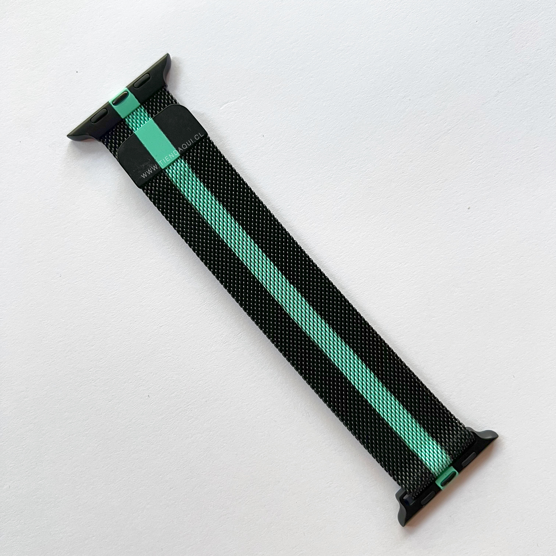 Correa metalizada color: negro con franja turquesa (38/40/41mm)