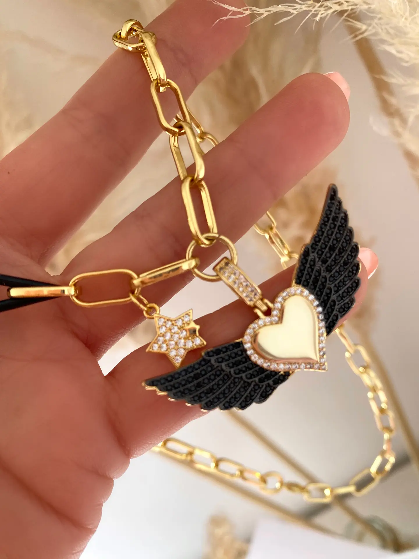 Collar Corazón Alado Circones Black con Punto luz Estrellita 1