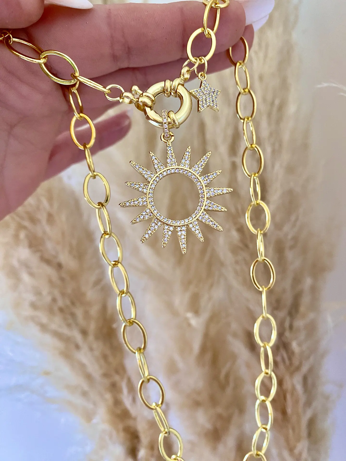 Collar Maxi Eslabones Sol y Estrellita gold 1