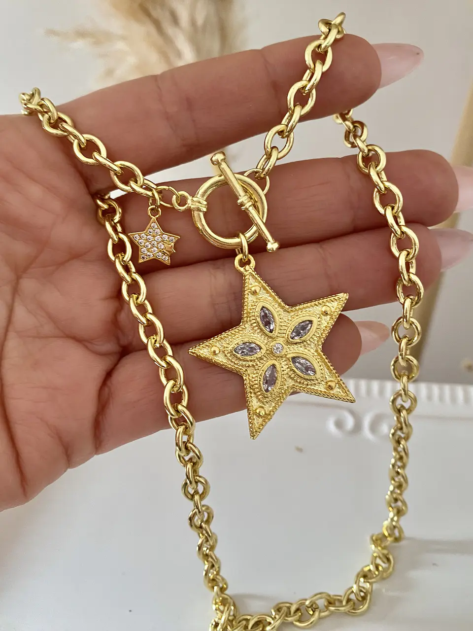 Collar Estrella Cristales Engastados y punto de luz lateral  1