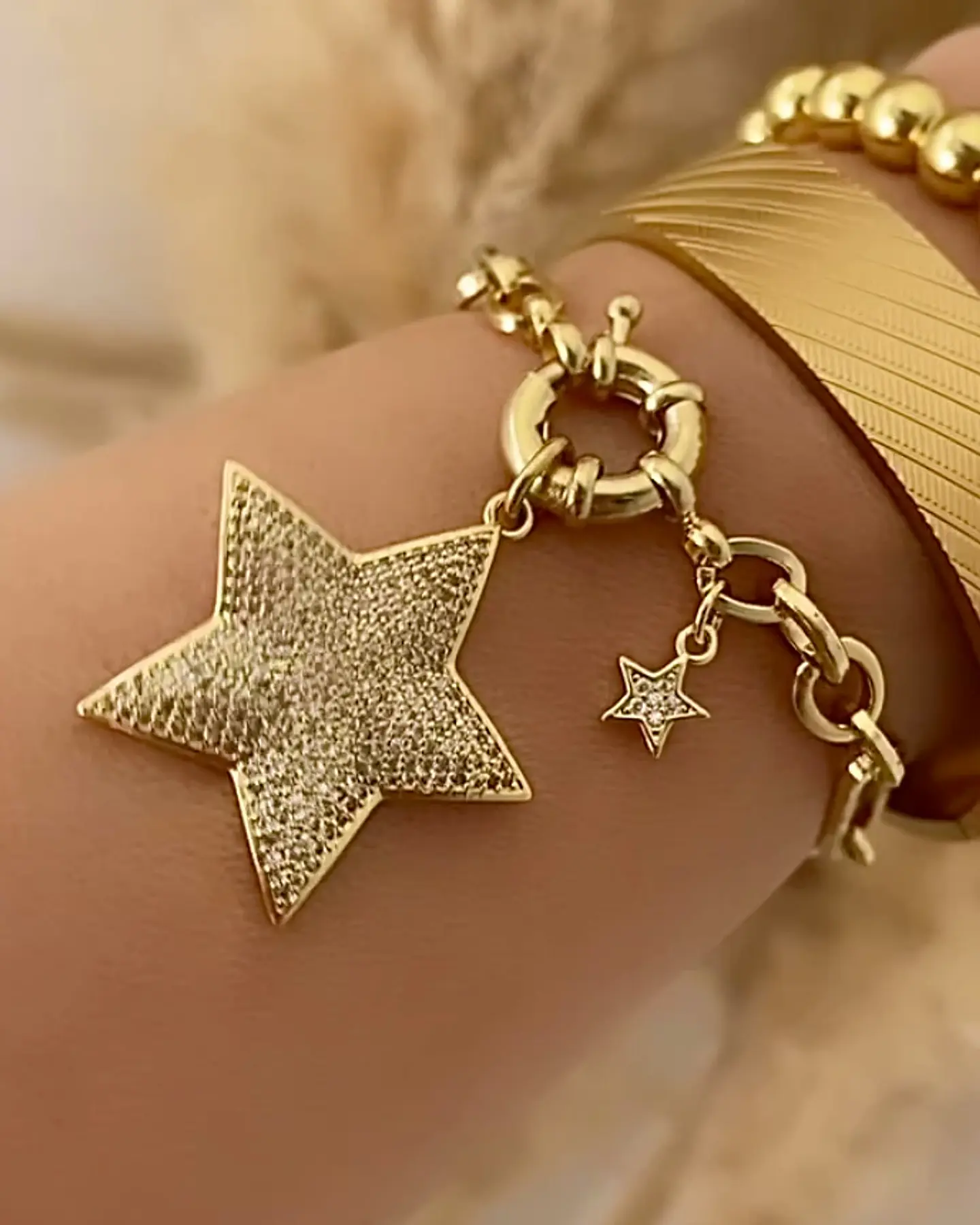 Pulsera Estrella Circones punto de luz gold 1