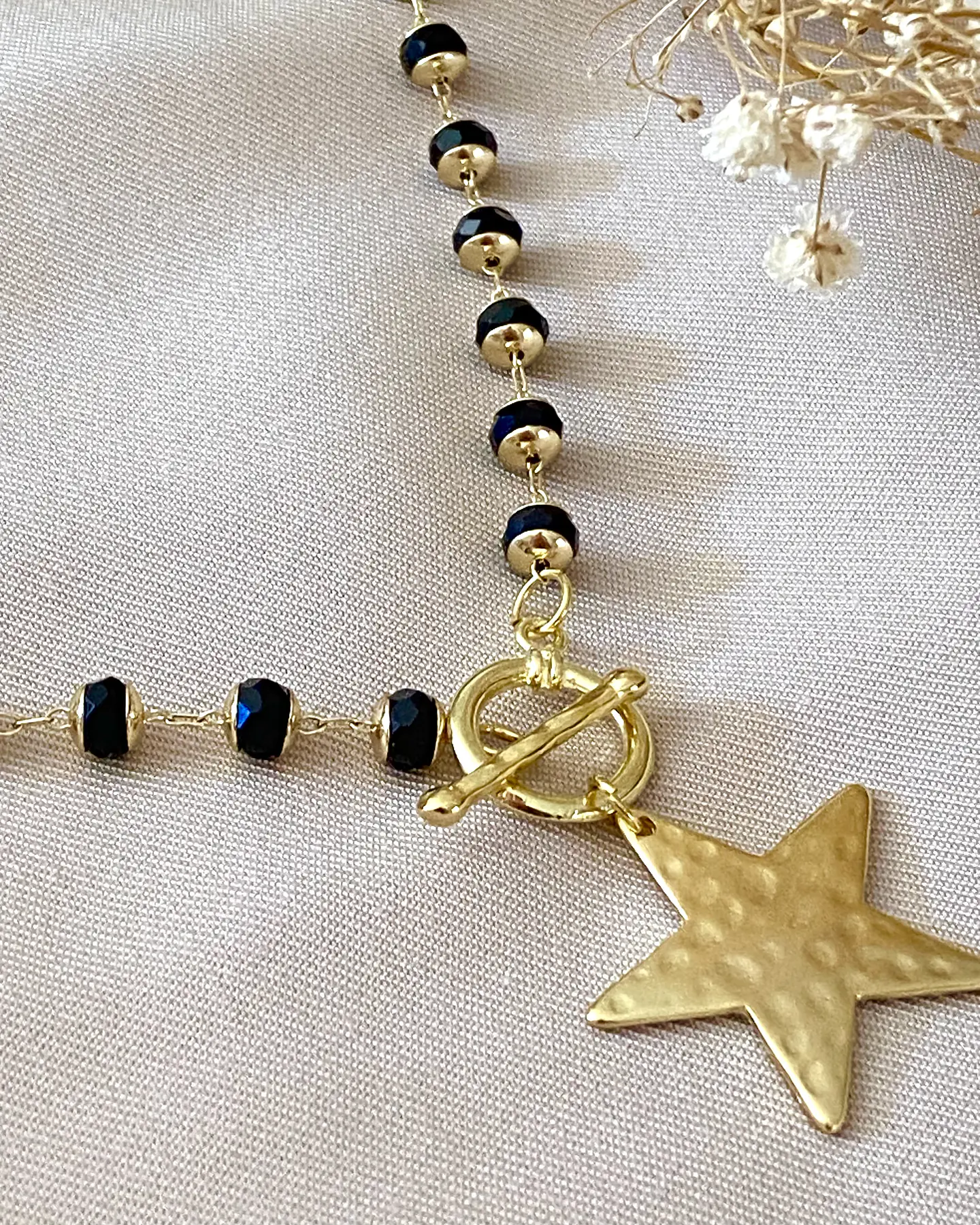 Collar Estrella eslabones cristal black facetados gold  1