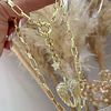 Collar Alas Circones y Estrella Gold