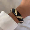 Maxi Brazalete Plumas Gold