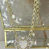 Collar maxi Corazón Virgen Nácar cristales gold