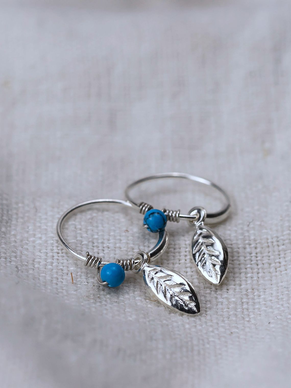 Piercing Solitario 10mm Pluma y Mostacilla Celeste 2