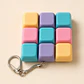 Llavero Fidget de 9 Teclas Pastel - Miniatura 4