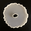 Molde de silicona posavasos circular, bordes irregulares, 12,5cm, con espacio central.
