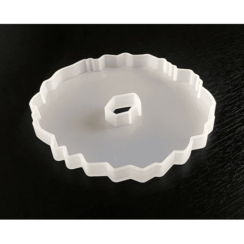 Molde de silicona posavasos circular, bordes irregulares, 12,5cm, con espacio central.