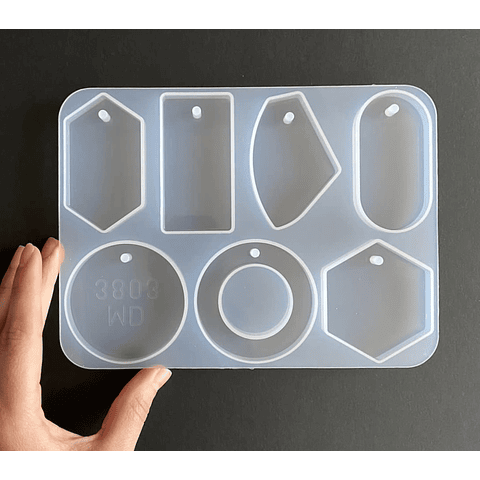 Molde de silicona 7 formas geométricas con perforación.