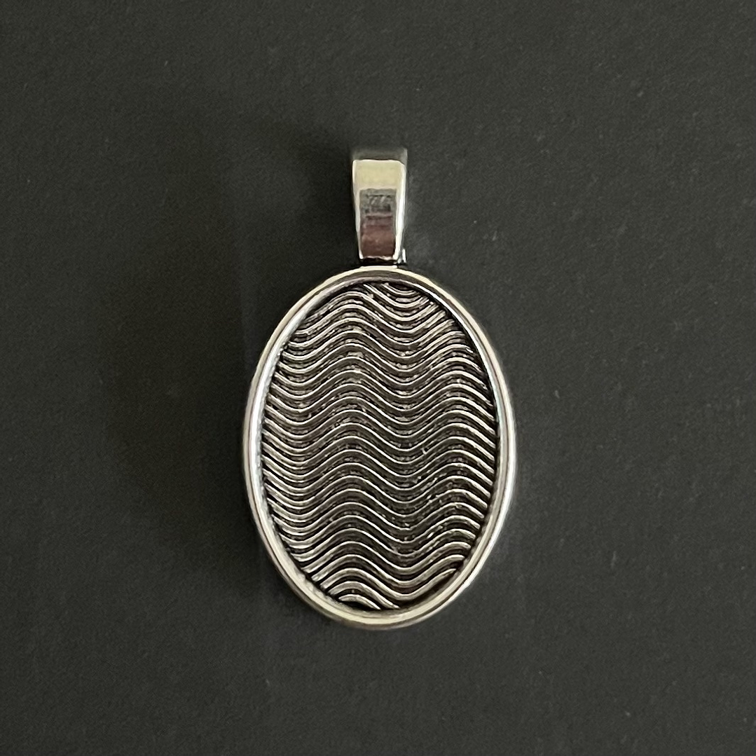 Camafeo #04 colgante OVALADO (1u), color plateado. 1