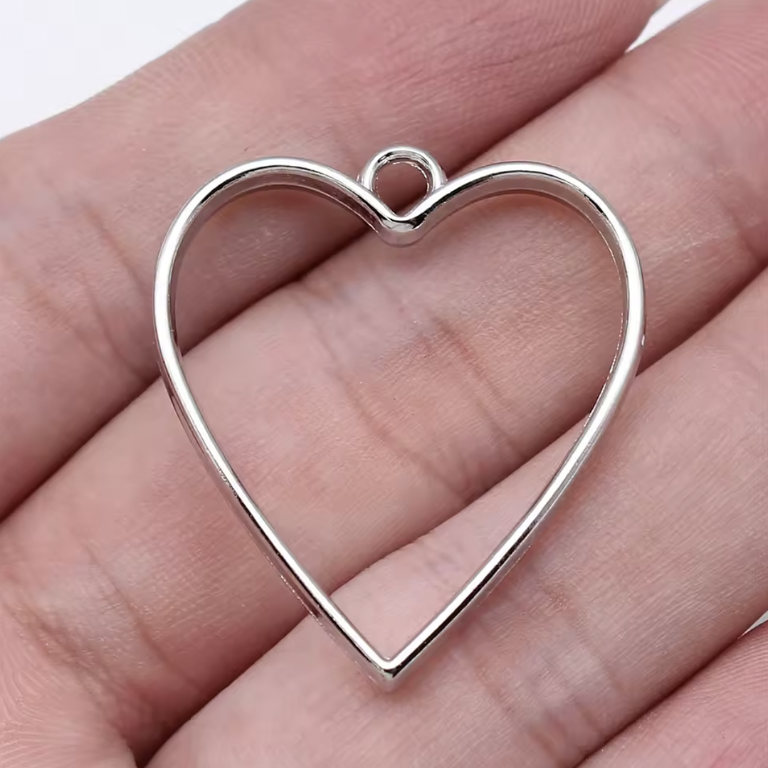 Bisel metálico CORAZÓN, 2,5cm x 3cm, 3 unidades, plateados. 1