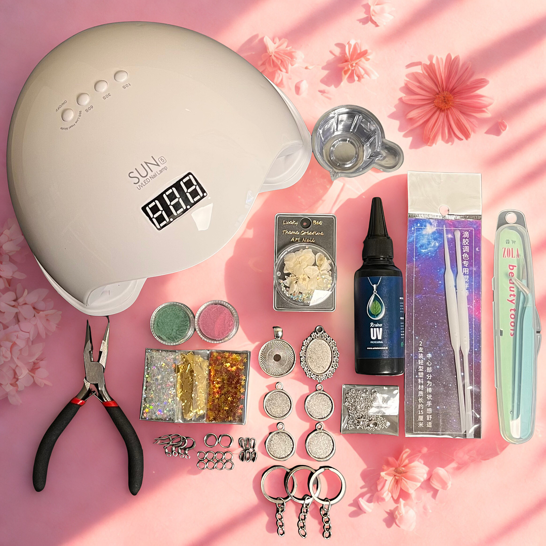 Kit inicial RESINA UV 50g con CAMAFEOS metálicos, flores, etc.. 1