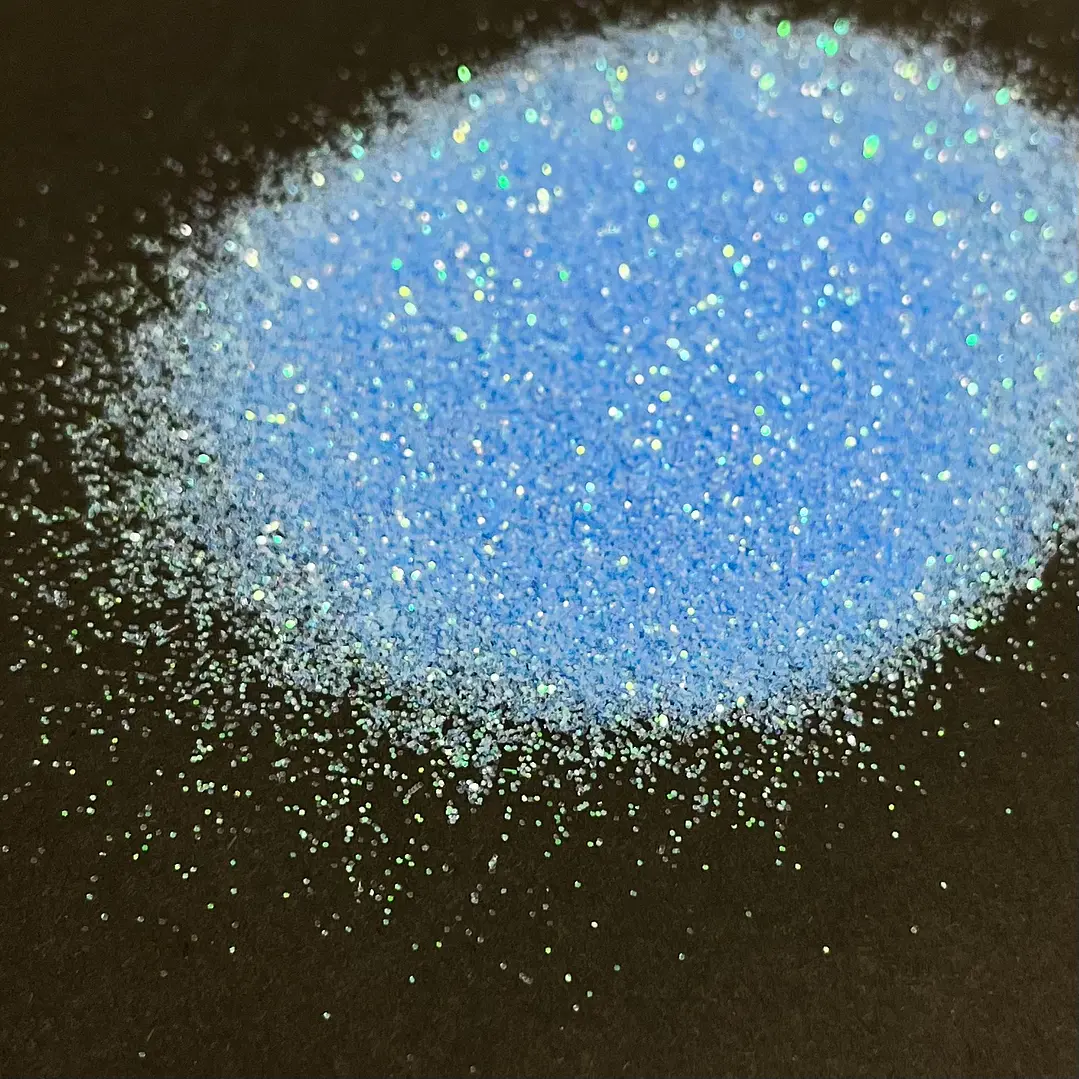 Glitter ultra fino iridiscente celeste (destellos verdes) 10g 1