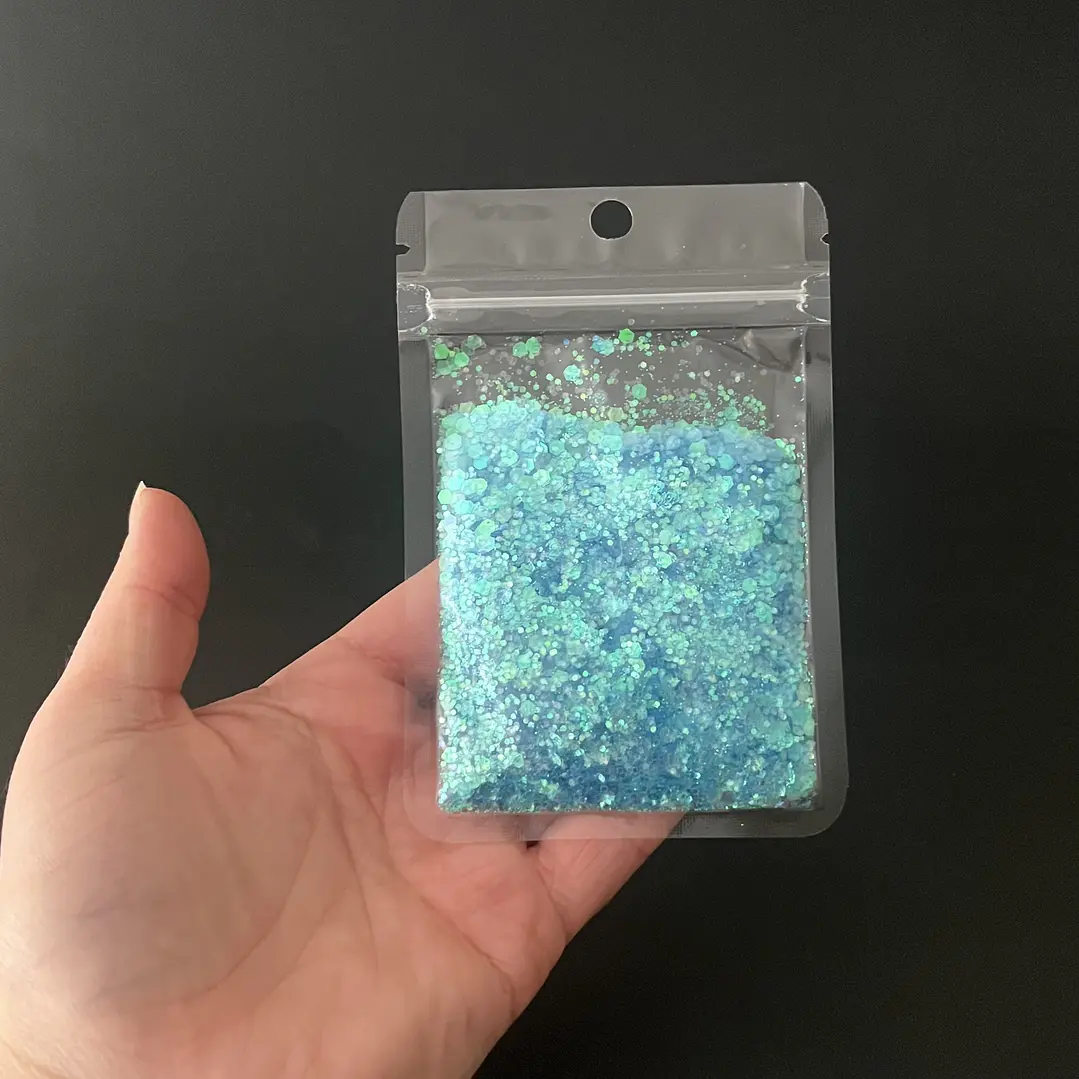 Shunky glitter iridiscente grueso, 15g, TURQUESA reflejos verde.  2