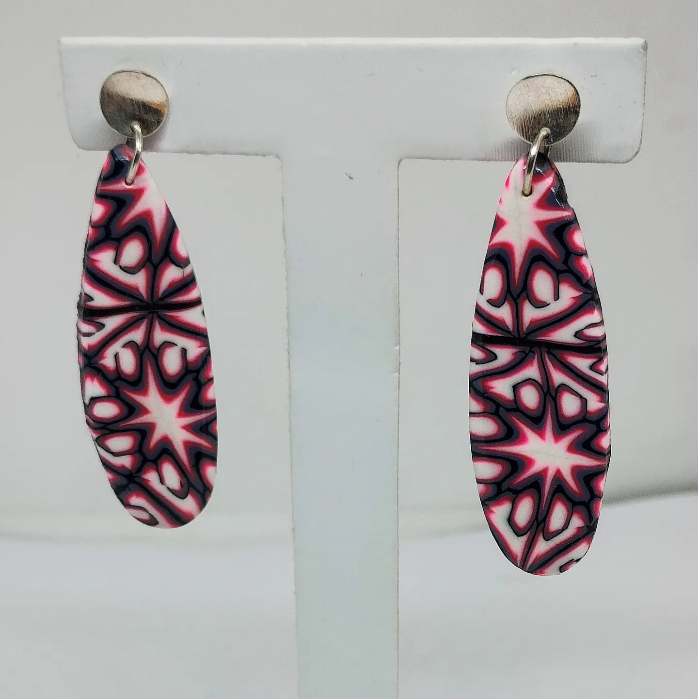 Gotas alargadas rosadas con negro 1