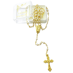 Golden rosary of beige pearls