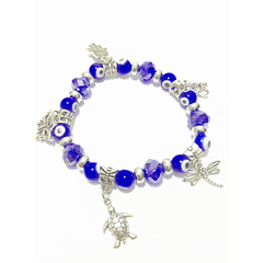 Crystal bracelet with various medals