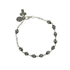 Pulsera de cristal con cruz.