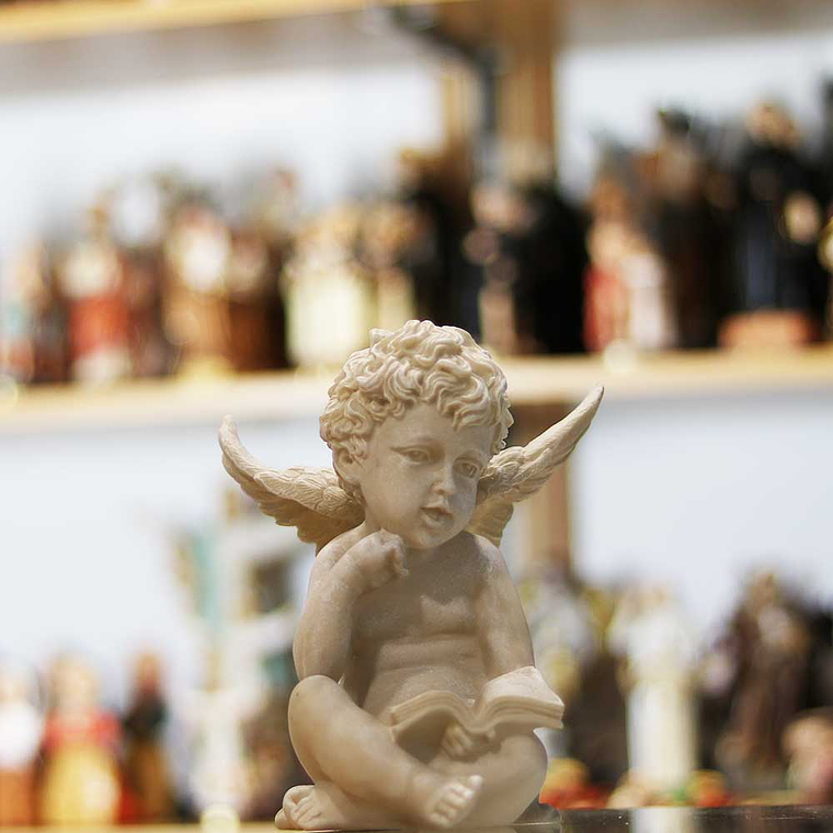 Angel reading outdoors 2