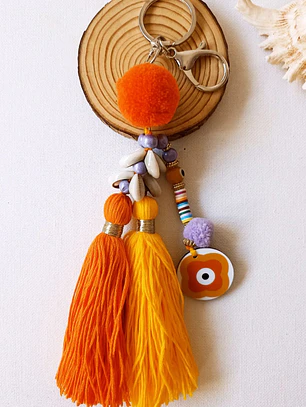 Porta-chaves Bohemian com pompons e conchas