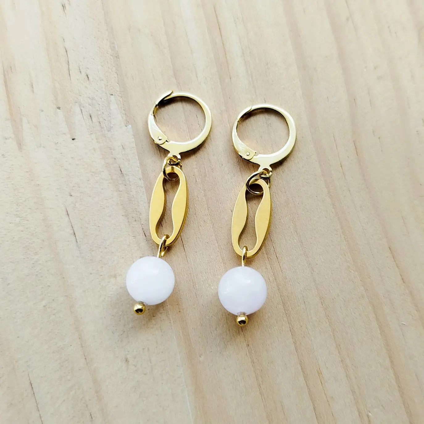 Brincos em aço dourado com Quartzo Rosa 3