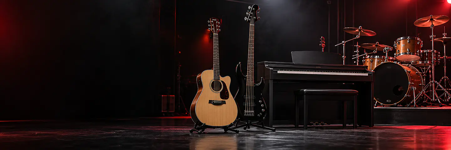 Instrumentos musicales para proyectos: guitarra, bajo, piano digital y batería. Imagen ilustrativa.