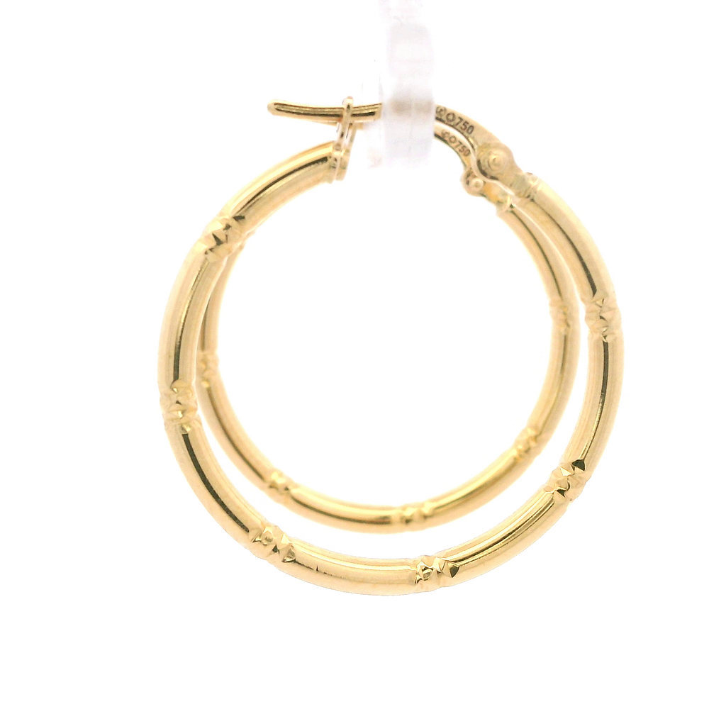 Aros de Oro Amarillo 18K Tubular con Tallados
