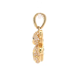 Colgante de Oro Amarillo 18K Oso con Micropiedras y Piedra Roja Central