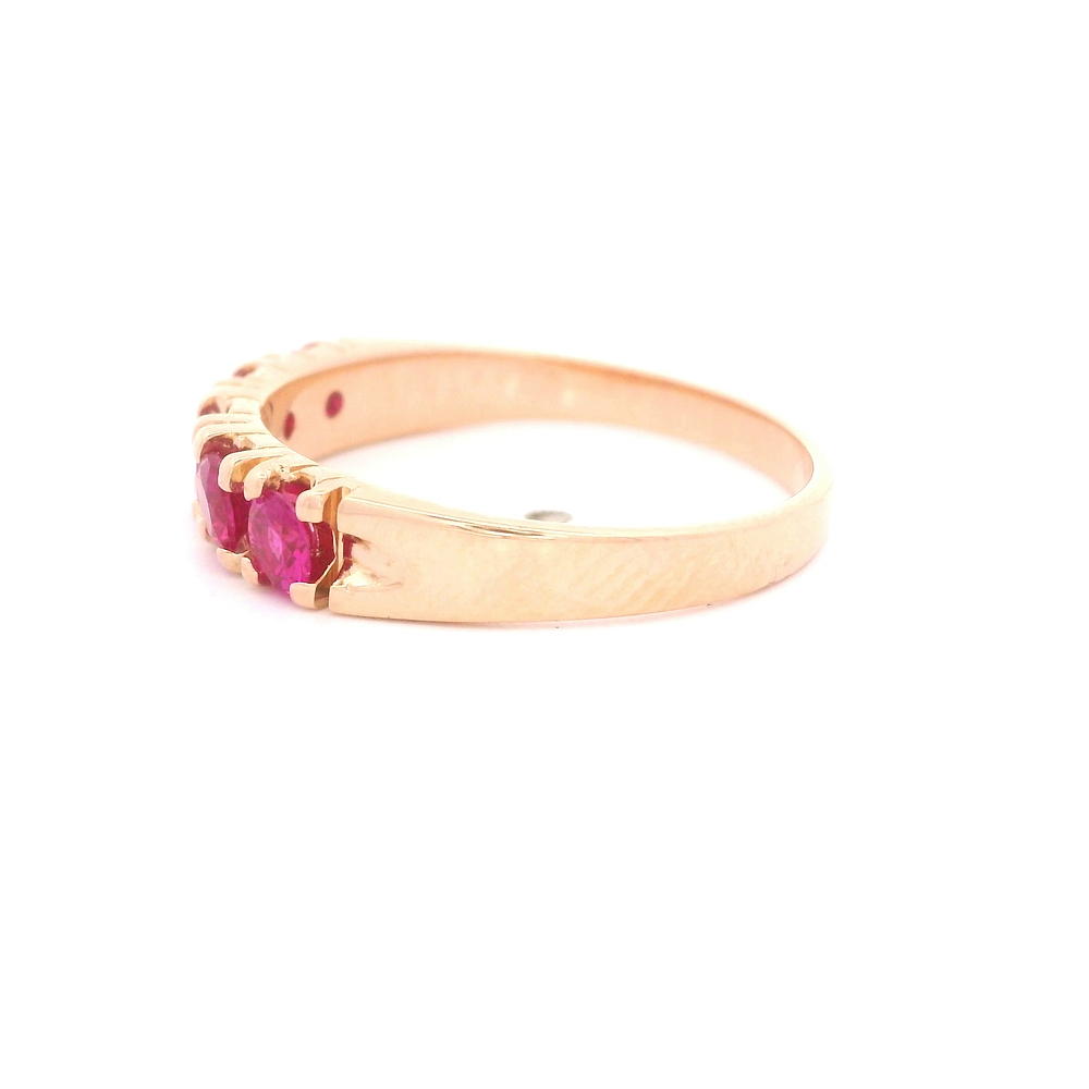 Anillo de Oro Amarillo 18K Cintillo con Piedra Fucsia
