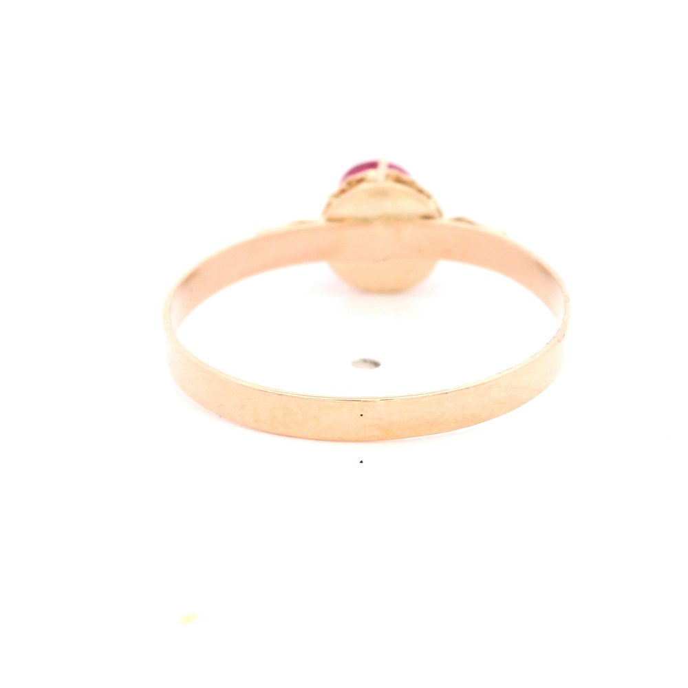 Anillo de Oro Amarillo 18K Circular con Piedra Fucsia