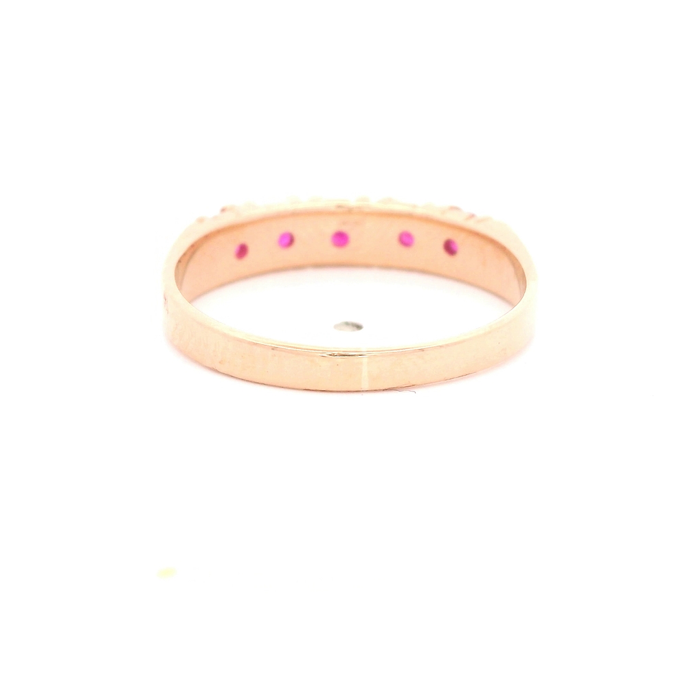 Anillo de Oro Amarillo 18K Cintillo con Piedra Fucsia