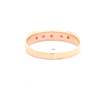 Anillo de Oro Amarillo 18K Cintillo con Piedra Fucsia