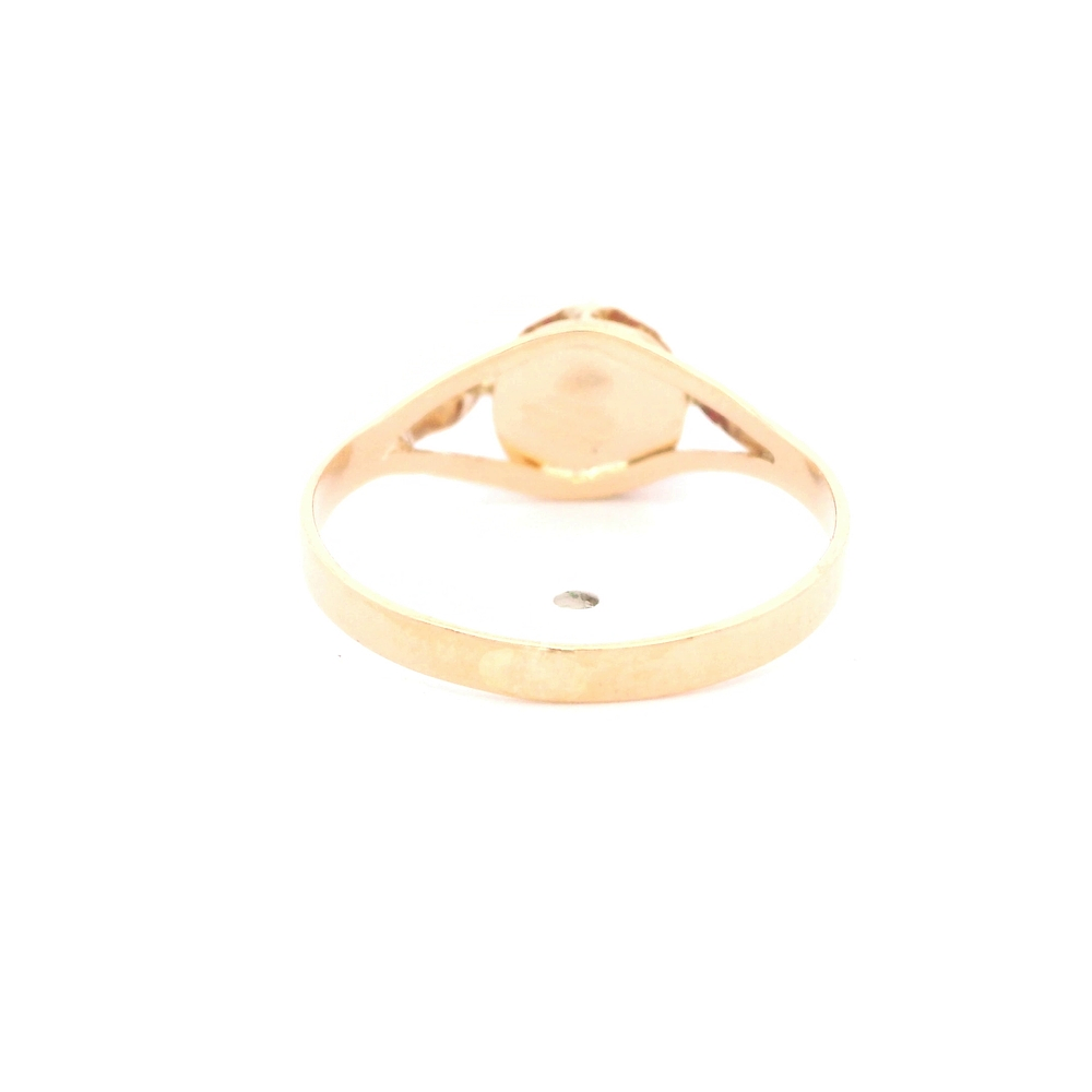 Anillo de Oro Amarillo 18K Circular con Piedra Fucsia