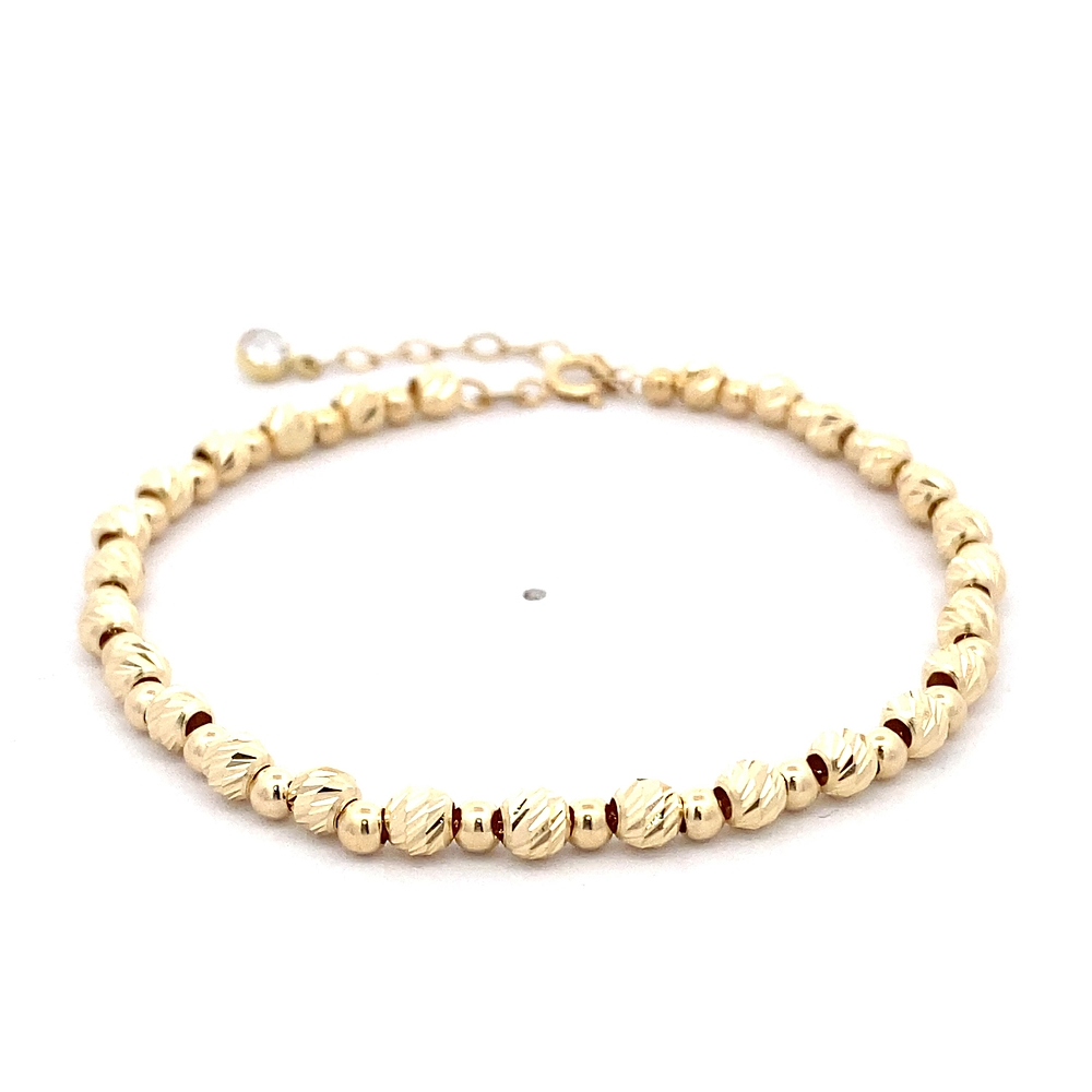 Pulsera de Oro Amarillo 18K Limada Esferas 19 cm Resorte