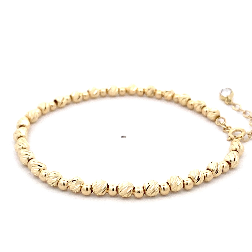 Pulsera de Oro Amarillo 18K Limada Esferas 19 cm Resorte