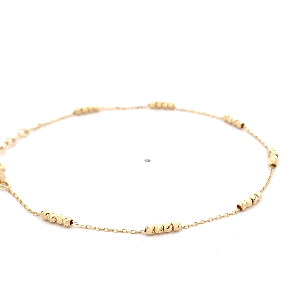 Pulsera de Oro Amarillo 18K Limada Esferas 16 cm Resorte