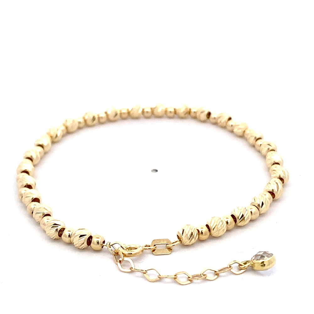 Pulsera de Oro Amarillo 18K Limada Esferas 19 cm Resorte