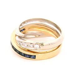 Anillo de Oro Bicolor 18K Entrelazado con 11 Diamantes y 12 Zafiros Princess