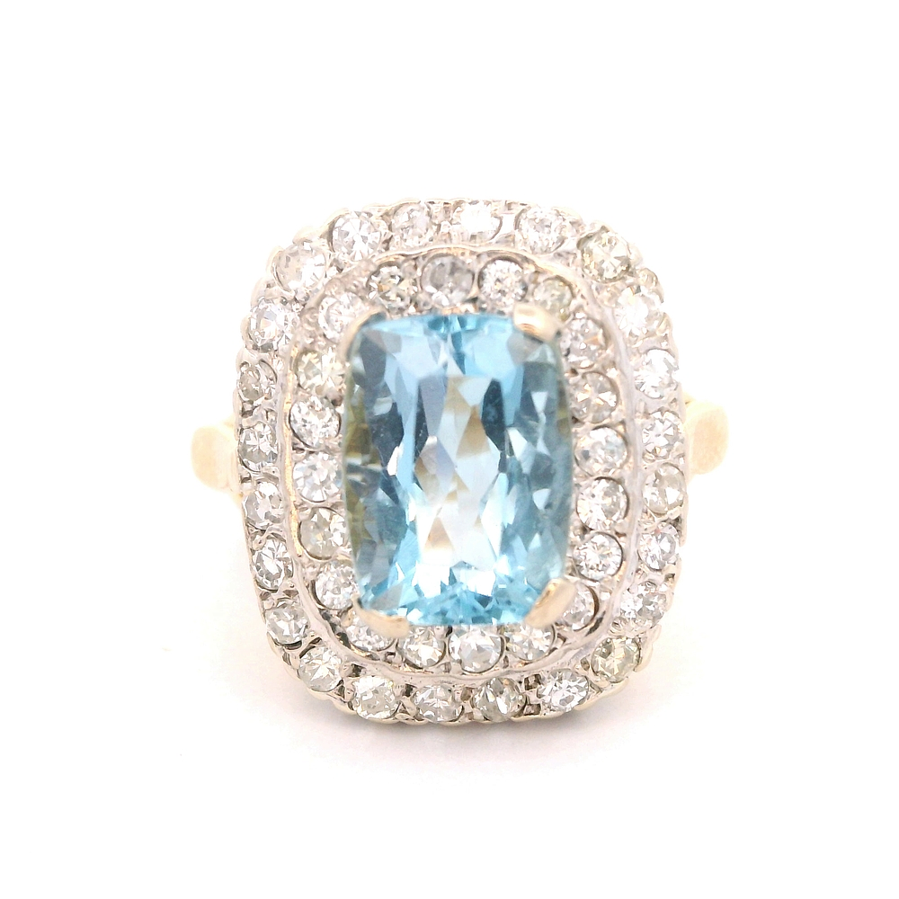 Anillo de Oro Amarillo y Blanco 18K Halo con Diamantes y Piedra Azul